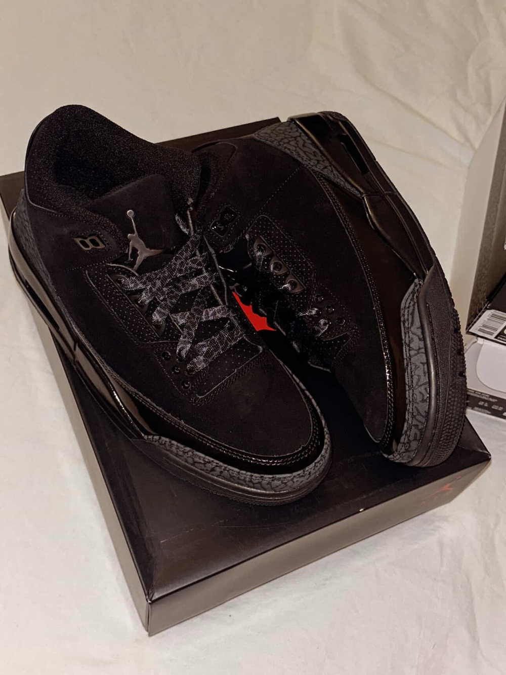 Jordan 3 Retro Men's Sneakers in Black with Subtle Red Accent